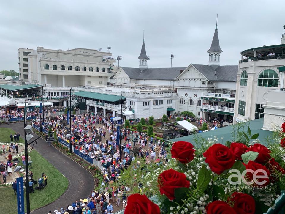 Kentucky Derby: high shot of churchill downs with roses in the foreground