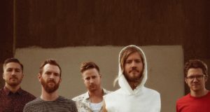 Moontaxi standing infront of a background