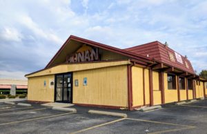 LaRosa's: Yellow building with a brown/red roof that says Hunan