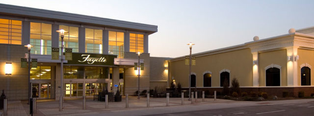 sunset picture of the main entrance to fayette mall