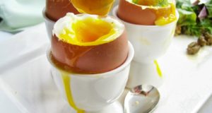 hard boiled egg in an egg holder
