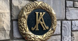 gold circle with a big K and A in the center