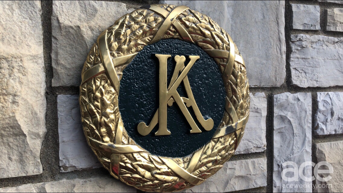 gold circle with a big K and A in the center