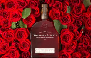 Woodford Reserve bottle in a bed of roses