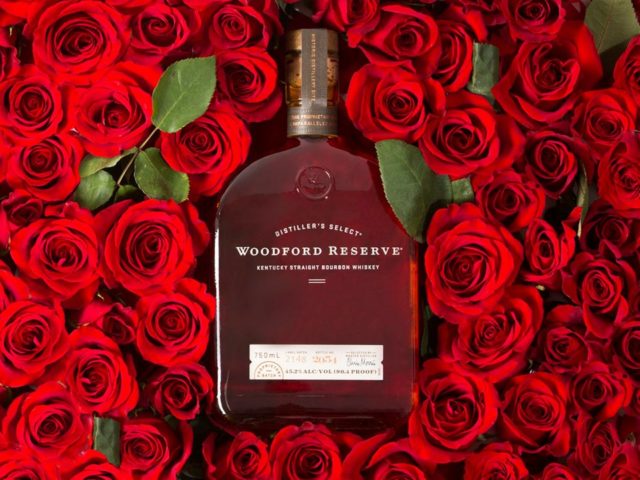 Woodford Reserve bottle in a bed of roses