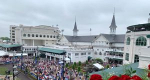 Kentucky Derby: high shot of churchill downs with roses in the foreground