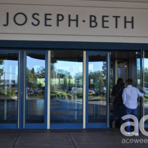 Joseph-Beth: two people walking through a door