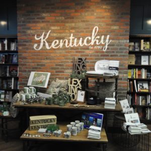 Joseph-Beth: wall that says kentucky and has a display in front of it